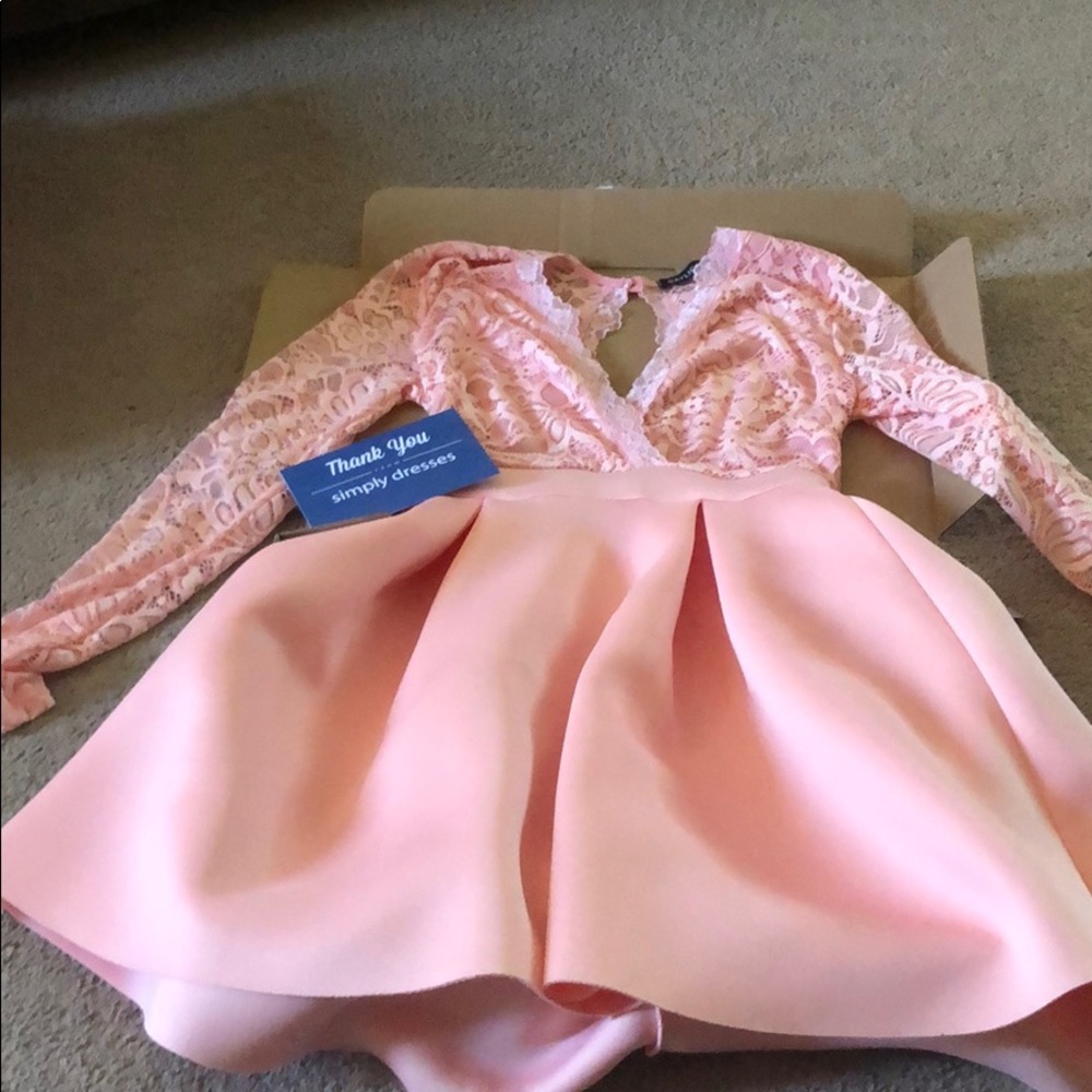 Light pink open back lace dress